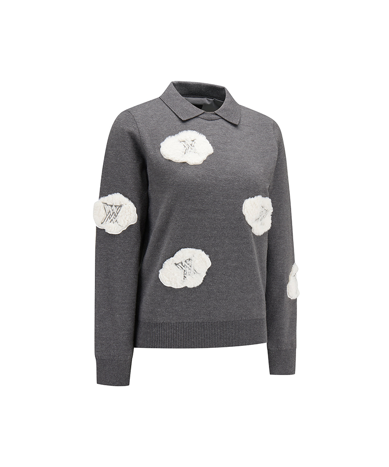 A dark gray knit polo sweater featuring white cloud-shaped patches with embroidered LV monogram details, displayed on a clean white background.